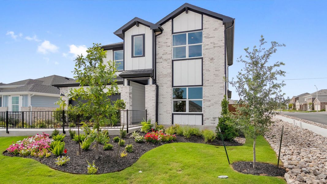 Front exterior of a new home in Thunder Rock, Marble Falls, TX, highlighting curb appeal (Image 25).