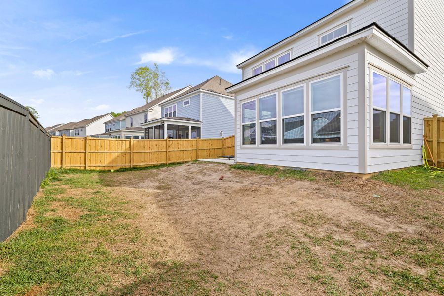 Exterior details and patio area of a home in , Charleston (Image 29).