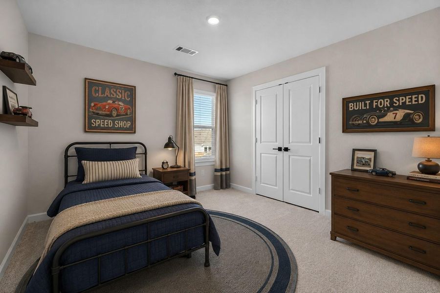 This secondary bedroom photo has been virtually staged.