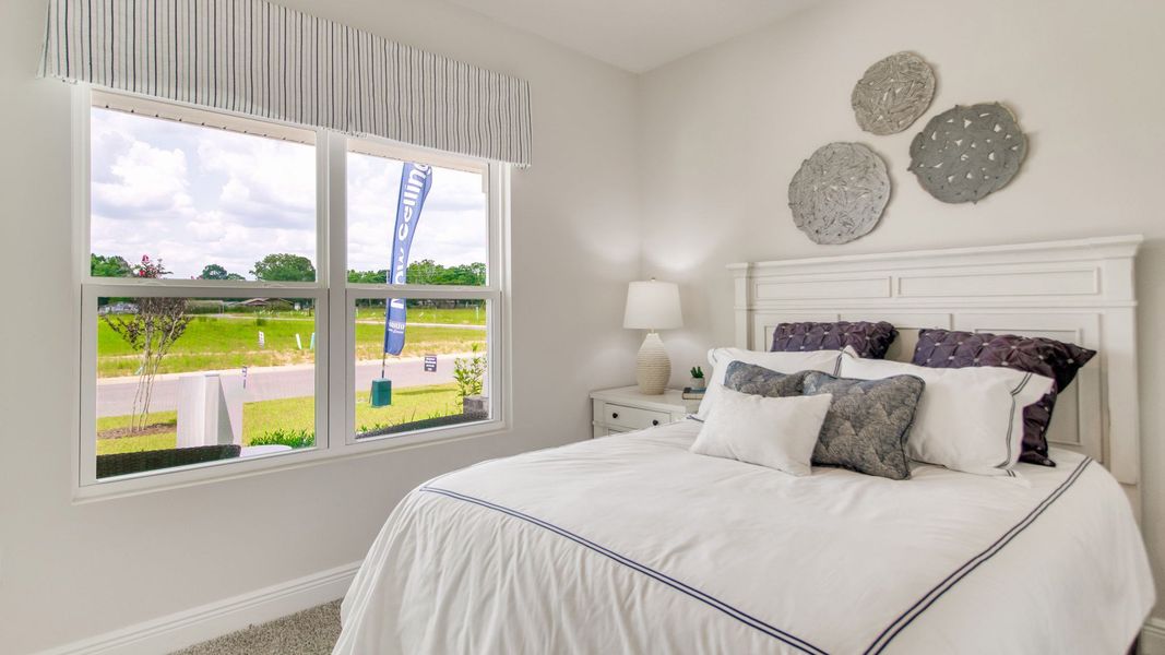 Furnished interior view inside a new home in Ashton Park Phase III, Freeport (Image 24).