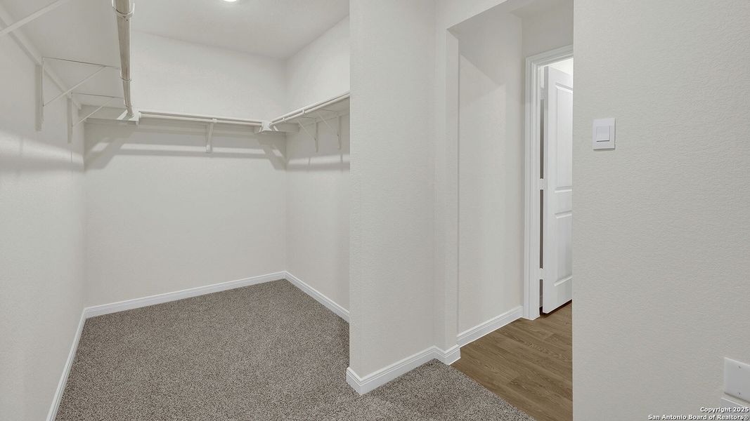 Spacious, unfurnished interior of a new home in Whisper South, San Marcos (Image 23).