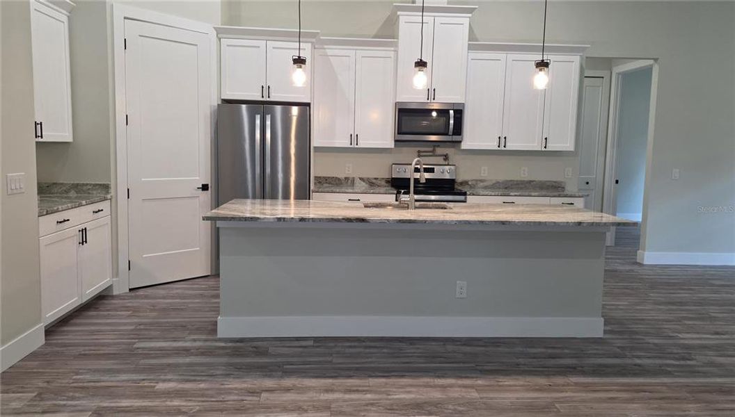 Furnished interior view inside a new home in , North Port (Image 7).