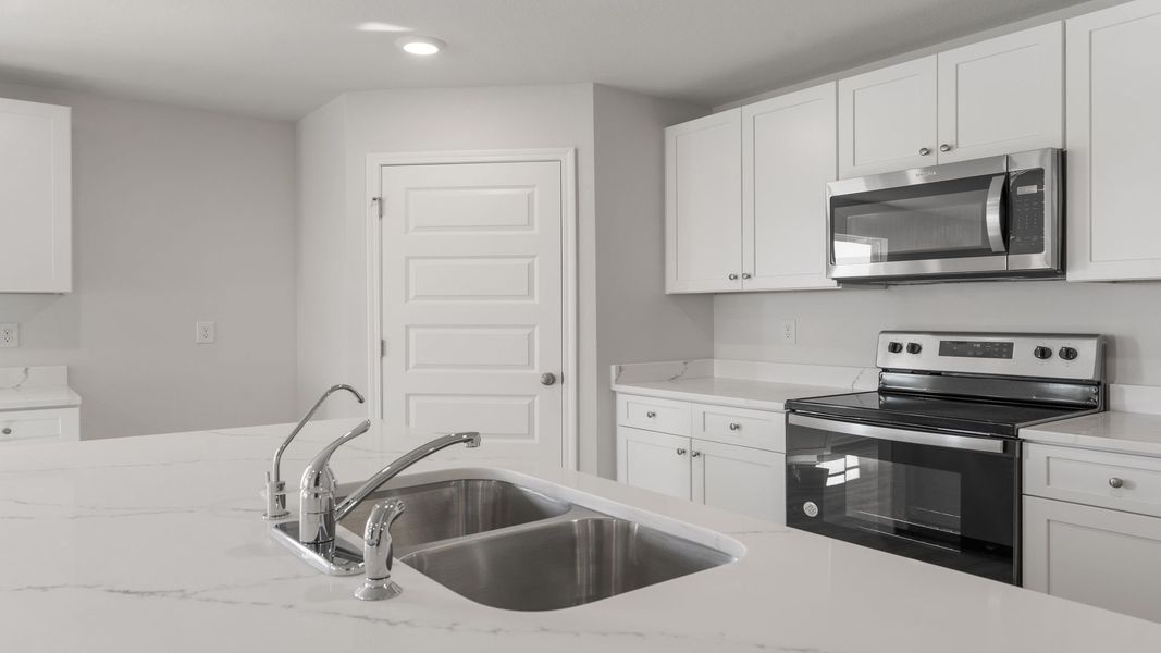 Furnished interior view inside a new home in Sunny Hills, Chipley (Image 6).