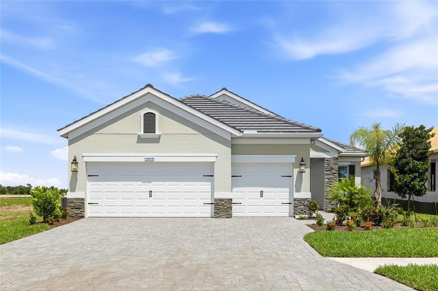 Front exterior of a new home in , Bradenton, FL, highlighting curb appeal (Image 2). Front exterior of a new home in , Bradenton, FL, highlighting curb appeal (Image 2).