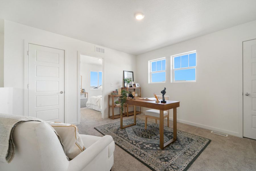 Furnished interior view inside a new home in Union Colony West, Greeley (Image 21).
