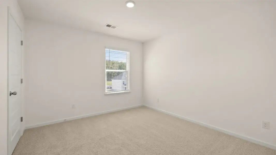 Spacious, unfurnished interior of a new home in The Highlands at Cedar Hill Landing, Navassa (Image 20).
