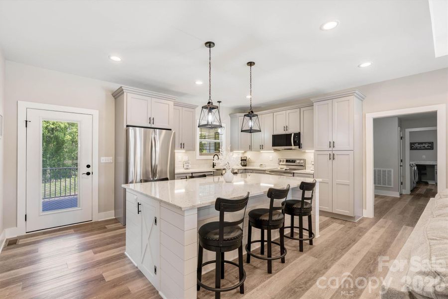 Furnished interior view inside a new home in , Lenoir (Image 30).