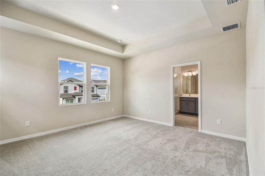 Spacious, unfurnished interior of a new home in Oakfield at Mount Dora Cottage Series, Mount Dora (Image 15).