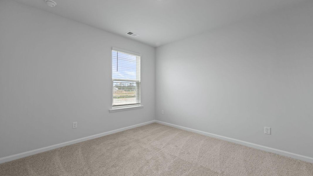 Spacious, unfurnished interior of a new home in Pine Hills at Cane Bay, Summerville (Image 21). Spacious, unfurnished interior of a new home in Pine Hills at Cane Bay, Summerville (Image 21).