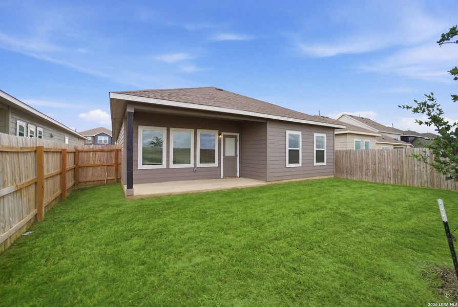 Exterior details and patio area of a home in Hennersby Hollow, San Antonio (Image 3).