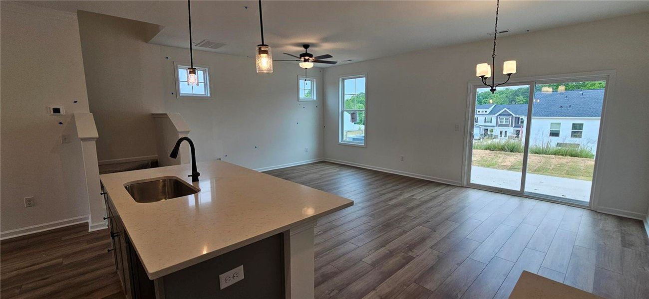 This bright, open concept living area seamlessly c This bright, open concept living area seamlessly c