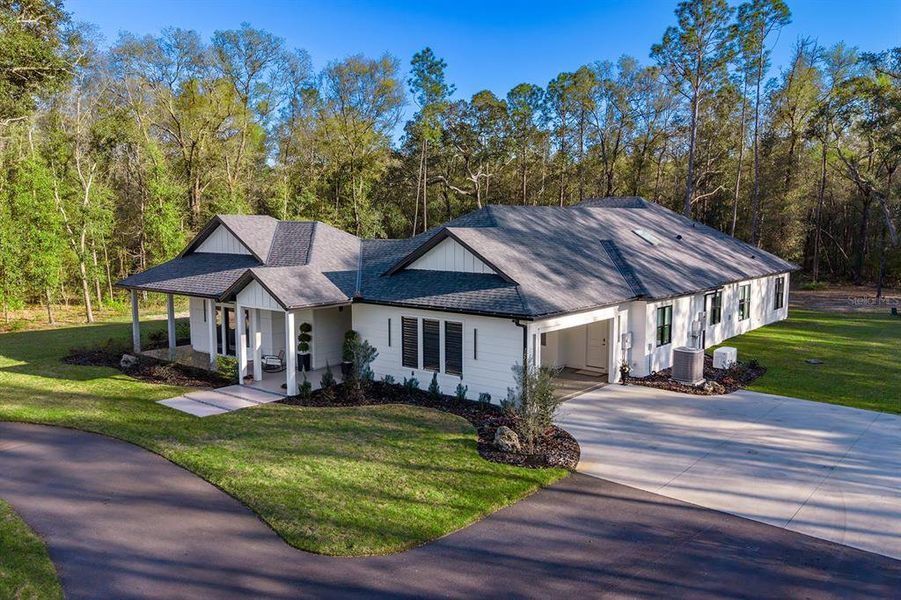 Front exterior of a new home in , High Springs, FL, highlighting curb appeal (Image 23).