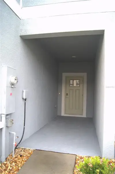 Exterior details and patio area of a home in , Zephyrhills (Image 3).