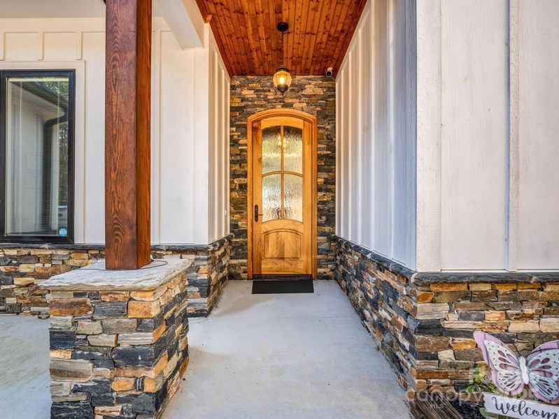 Exterior details and patio area of a home in , Mill Spring (Image 23).