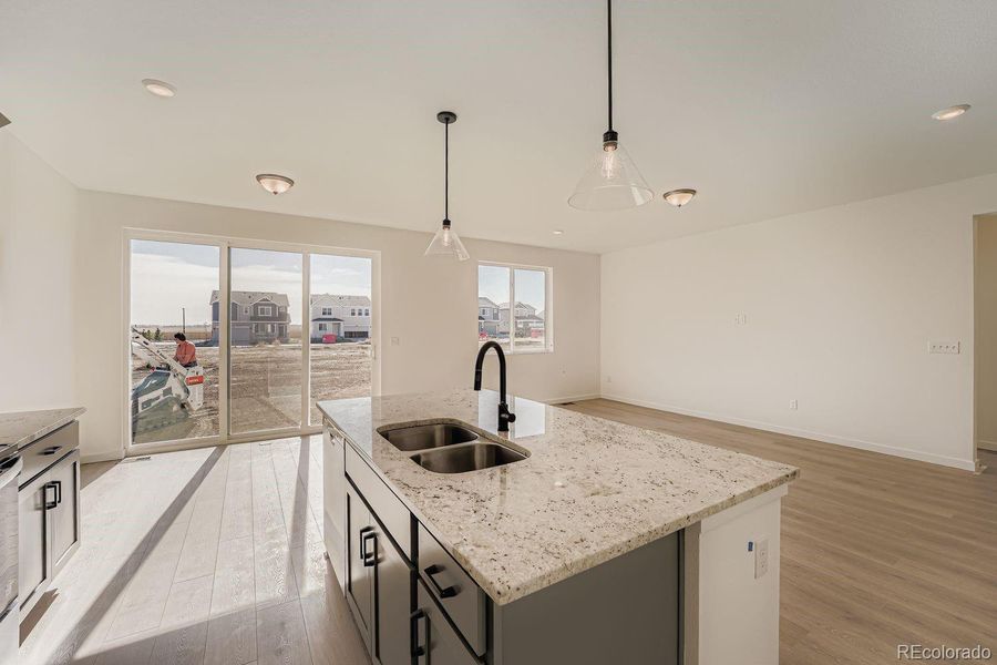 Images not from actual home, but are from same floor plan.