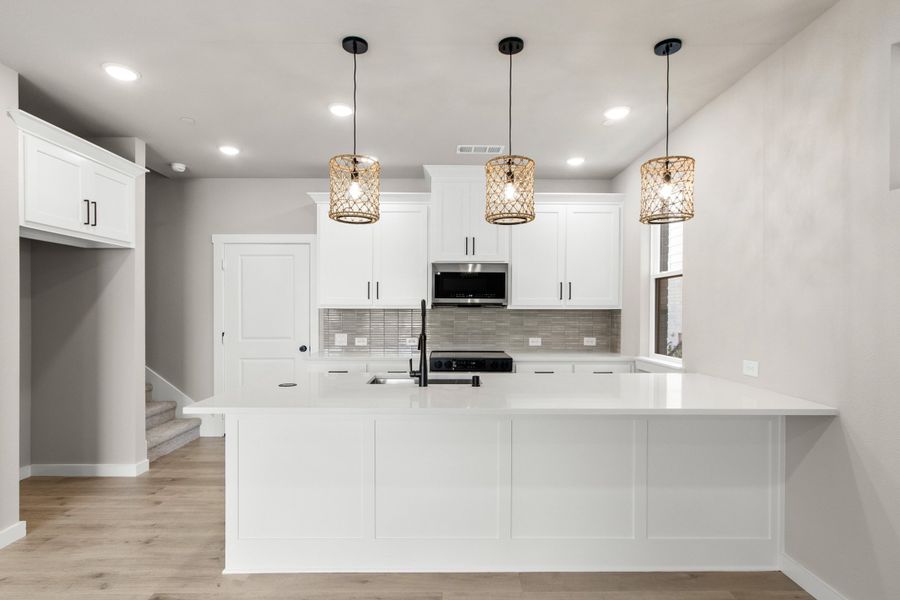 Furnished interior view inside a new home in Wildridge, Oak Point (Image 9).