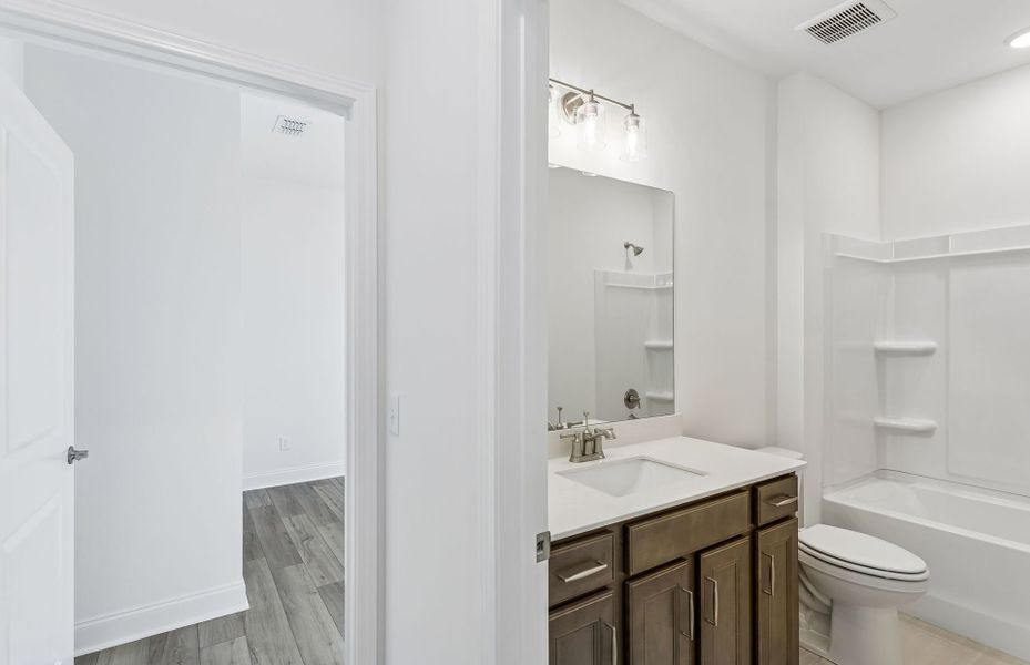 Furnished interior view inside a new home in Del Webb Southern Harmony, Murfreesboro (Image 10).