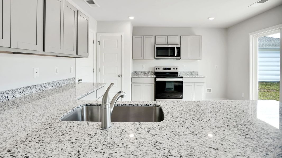 Furnished interior view inside a new home in Lockwood Landing, Supply (Image 6).
