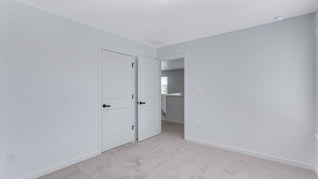 Representative unfurnished interior of a home built from the Calhan by D.R. Horton in Vantage, Berthoud (Image 28).