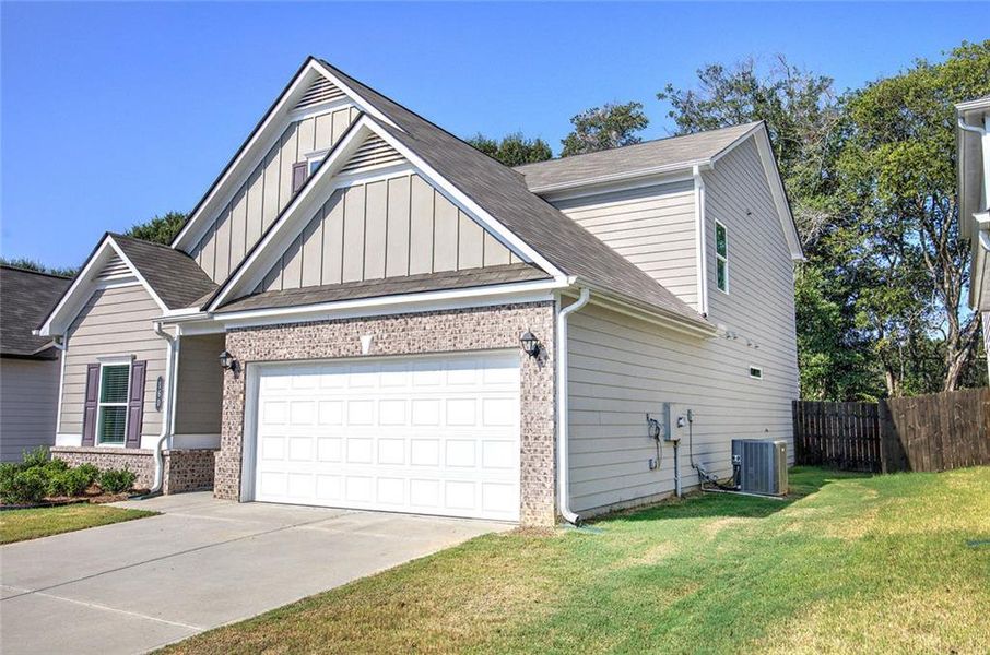 Front exterior of a new home in , Cartersville, GA, highlighting curb appeal (Image 22).