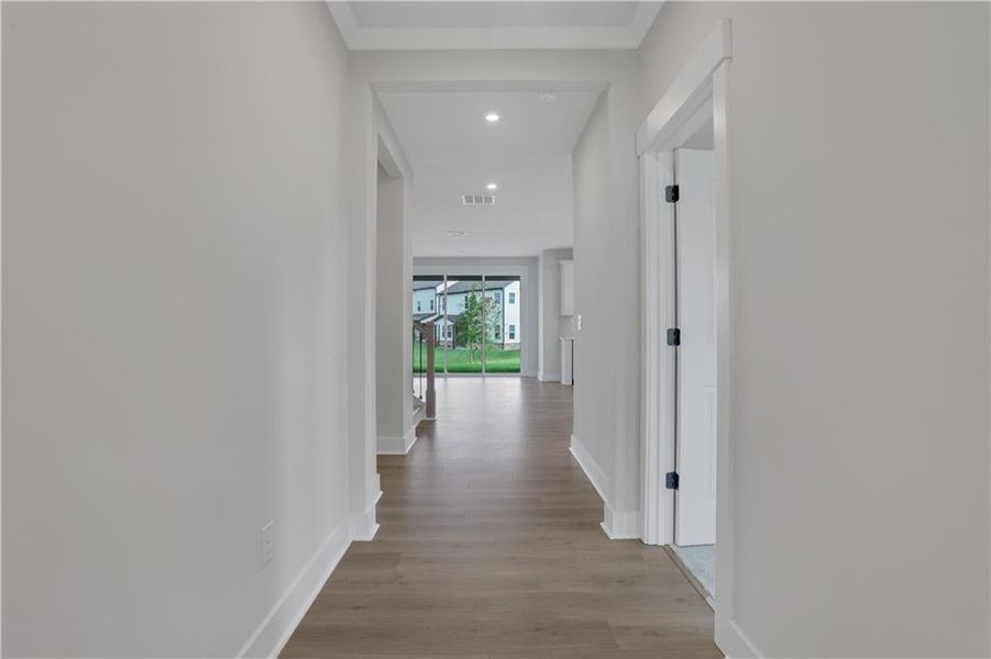 Spacious, unfurnished interior of a new home in The Paddocks at Doc Hughes, Buford (Image 42).