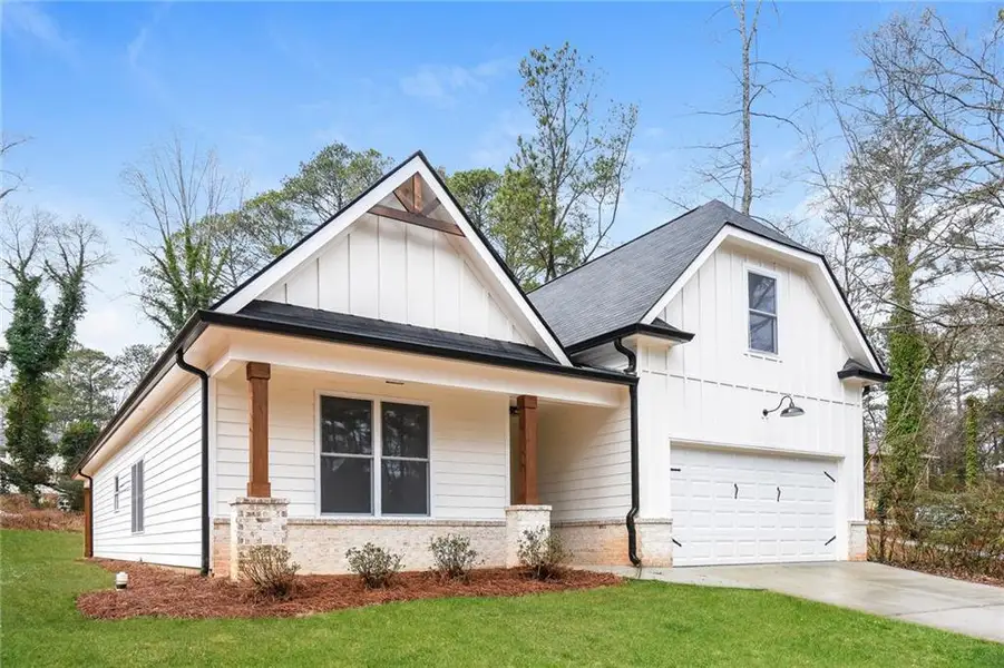 Front exterior of a new home in , Lilburn, GA, highlighting curb appeal (Image 1). Front exterior of a new home in , Lilburn, GA, highlighting curb appeal (Image 1).