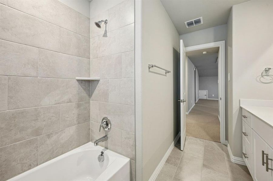 Furnished interior view inside a new home in Parks at Foster Crossing - Spring Series, Anna (Image 16).