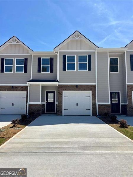 Front exterior of a new home in Azalea Hills, Temple, GA, highlighting curb appeal (Image 1). Front exterior of a new home in Azalea Hills, Temple, GA, highlighting curb appeal (Image 1).