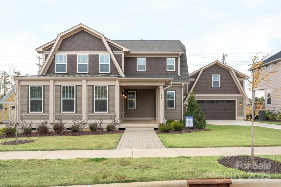 Front exterior of a new home in Riverwalk, Rock Hill, SC, highlighting curb appeal (Image 1).
