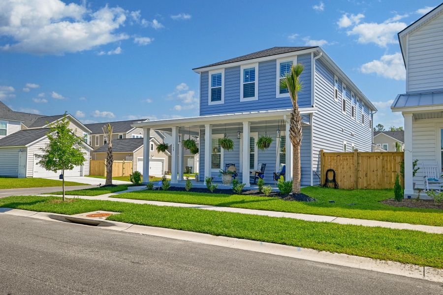Exterior details and patio area of a home in Heron's Walk at Summers Corner, Summerville (Image 30).