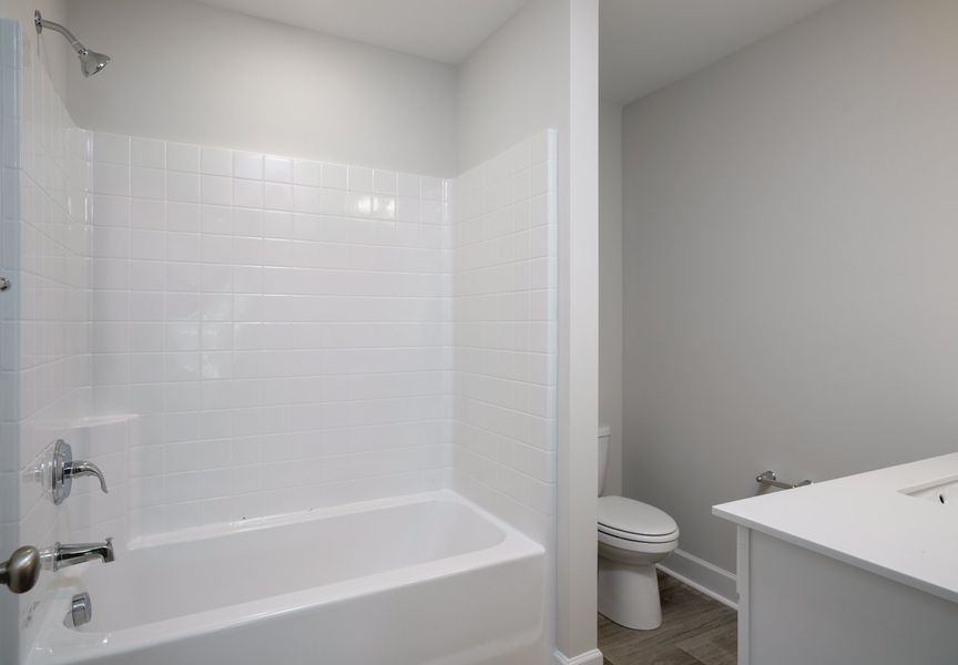 Representative furnished interior of a home built from the The Kennedy by Cothran Homes in Holly Ridge, Greenville (Image 31).