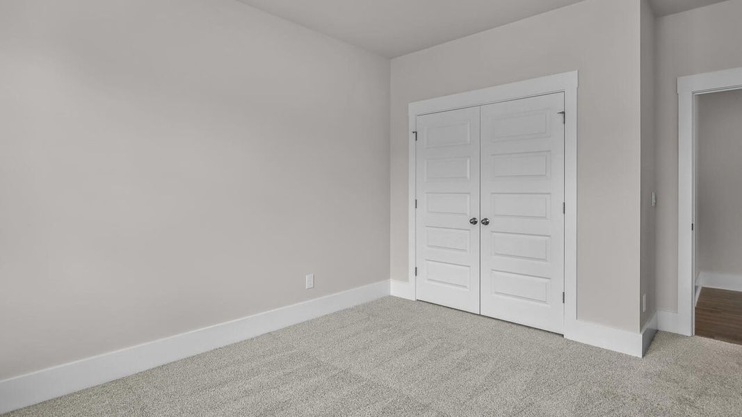 Spacious, unfurnished interior of a new home in The Haven at Indigo Preserve, Leland (Image 23).