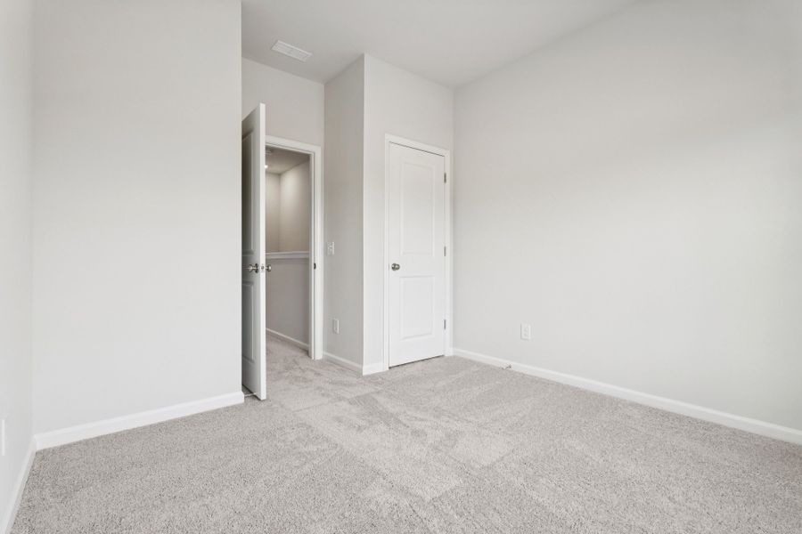 Spacious, unfurnished interior of a new home in Lakeview Village, Charlotte (Image 18). Spacious, unfurnished interior of a new home in Lakeview Village, Charlotte (Image 18).