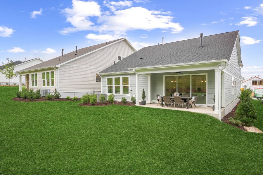 Representative exterior photo of a completed home built from the Cypress Cove by Tri Pointe Homes in The Pines Collection at Serenity, Fuquay Varina, NC (Image 2).