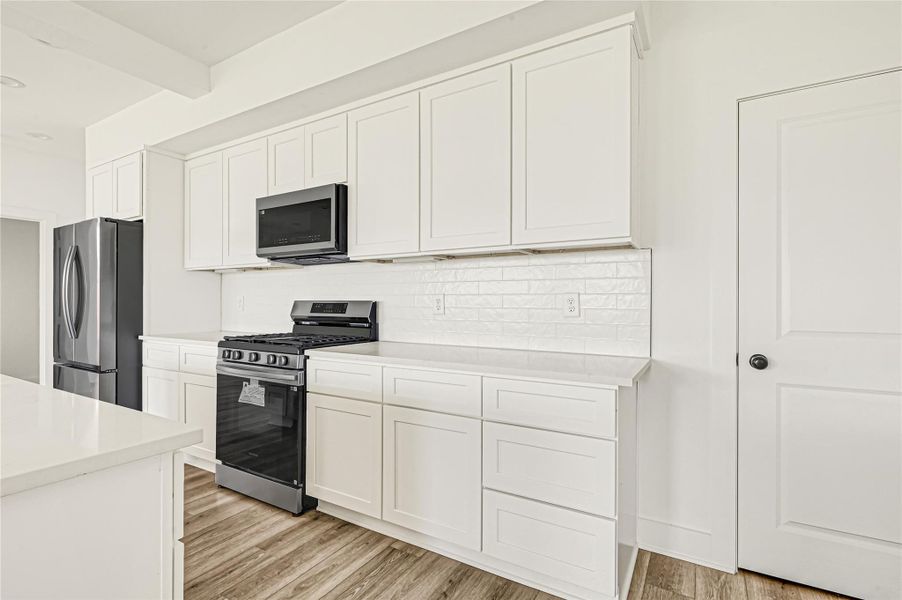 Sleek cabinetry, stainless steel appliances, and contemporary finishes. Sleek cabinetry, stainless steel appliances, and contemporary finishes.
