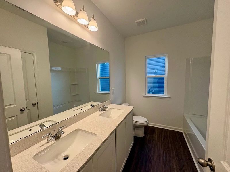 Bath 2 - Stylish finishes and dramatic contrast throughout.