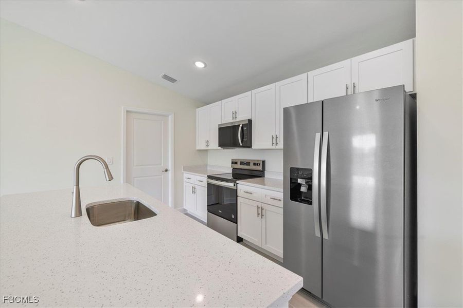 Furnished interior view inside a new home in Cape Coral, Cape Coral (Image 11). Furnished interior view inside a new home in Cape Coral, Cape Coral (Image 11).