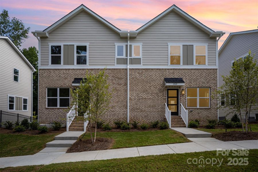 Front exterior of a new home in , Charlotte, NC, highlighting curb appeal (Image 26).