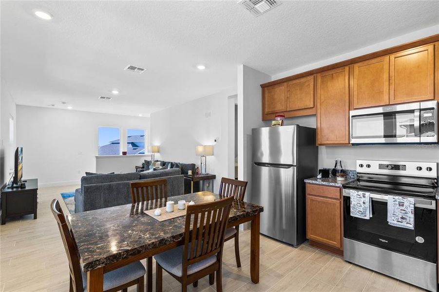 Furnished interior view inside a new home in Laureate Park, Orlando (Image 38).