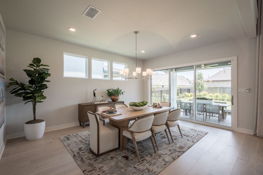 Representative furnished interior of a home built from the Woodbridge by Tri Pointe Homes in Bridgeland, Cypress (Image 12).