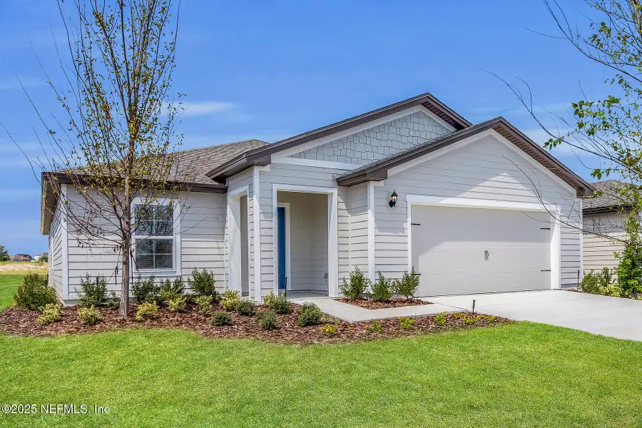 Front exterior of a new home in , Green Cove Springs, FL, highlighting curb appeal (Image 17). Front exterior of a new home in , Green Cove Springs, FL, highlighting curb appeal (Image 17).