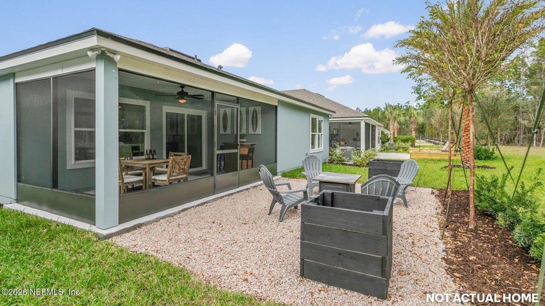 Exterior details and patio area of a home in Sawmill Branch, Palm Coast (Image 24).