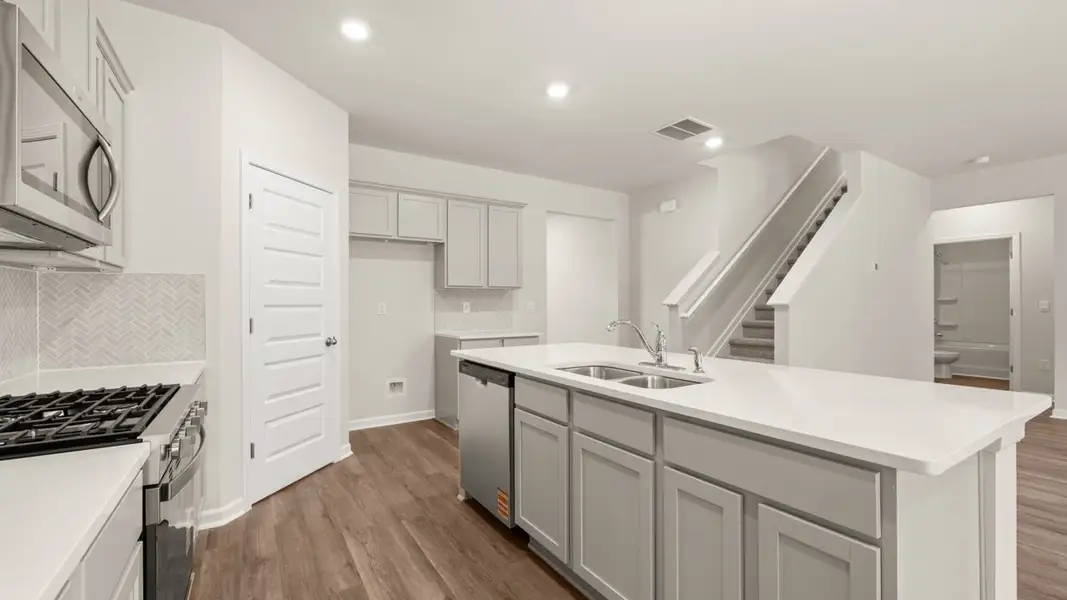Furnished interior view inside a new home in Preserve at Dove Creek, Statham (Image 8).