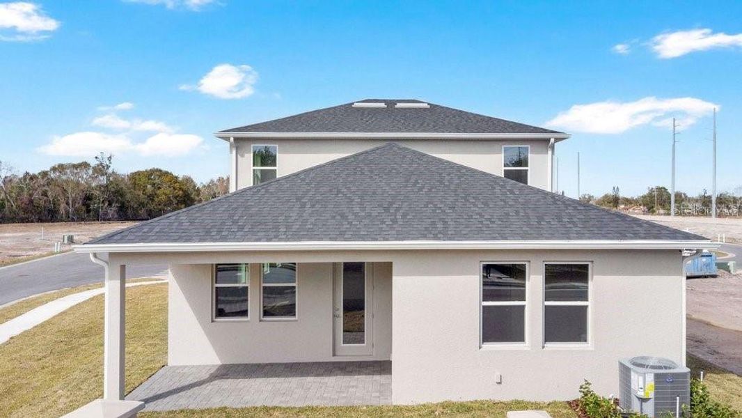 Exterior details and patio area of a home in Yucatan Gardens, Orlando (Image 18).