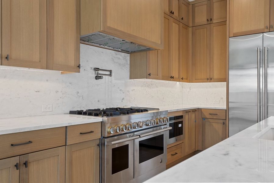 Furnished interior view inside a new home in Milky Way at River Place, Austin (Image 4).