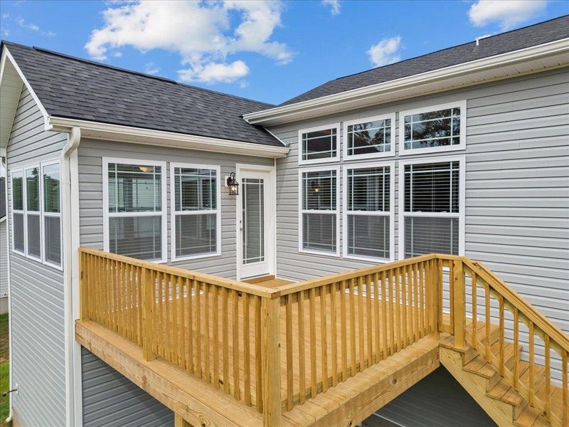 Exterior details and patio area of a home in Fall Creek, Inman (Image 16).