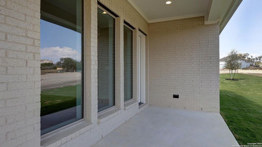 Exterior details and patio area of a home in Esperanza 50', Boerne (Image 25).