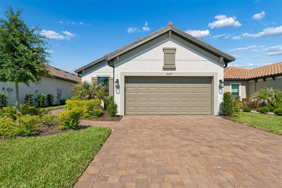 Front exterior of a new home in , Wesley Chapel, FL, highlighting curb appeal (Image 27).