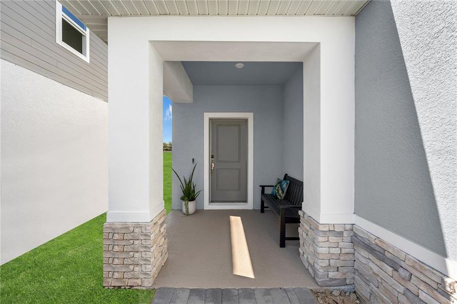 Exterior details and patio area of a home in Oakfield Trails, Parrish (Image 28).
