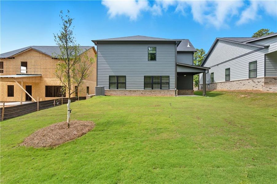 Exterior details and patio area of a home in Meadow Pines, Dallas (Image 11).